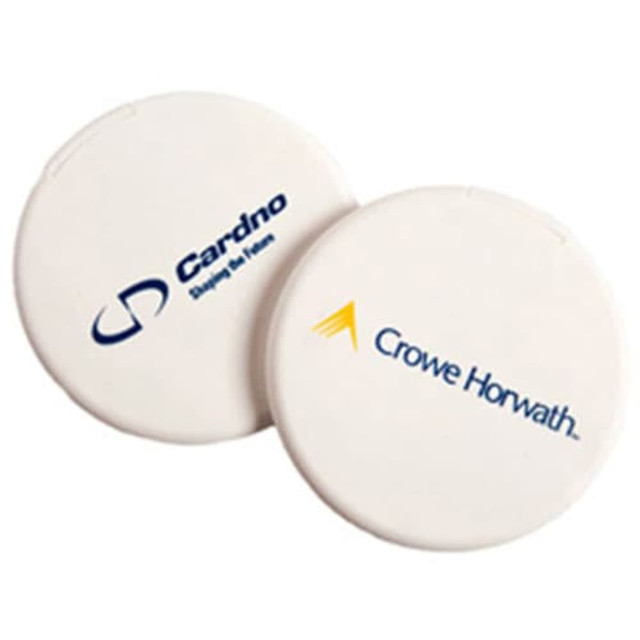 A circular mint card in white, featuring a logo on one side and a different logo on the other side.