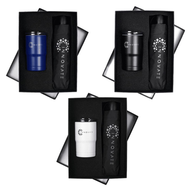 A tumbler and an umbrella in black, white, and blue, presented in a black gift box with logos.