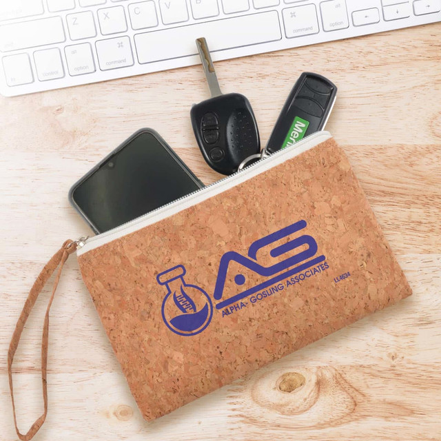 A cork utility case featuring a logo, with a smartphone, car keys, and a key fob visible inside. A cork utility case featuring a logo, with a smartphone, car keys, and a key fob visible inside.