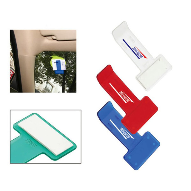 A set of multi-coloured office clips in green, white, red, and blue, featuring a logo.