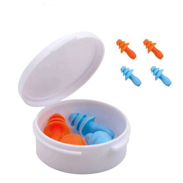 A white case containing two pairs of earplugs, one orange and one blue, with additional blue earplugs displayed above.