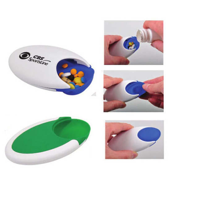 A pill box in white and green with a logo, featuring a compartment for storing various pills and a secure closure.