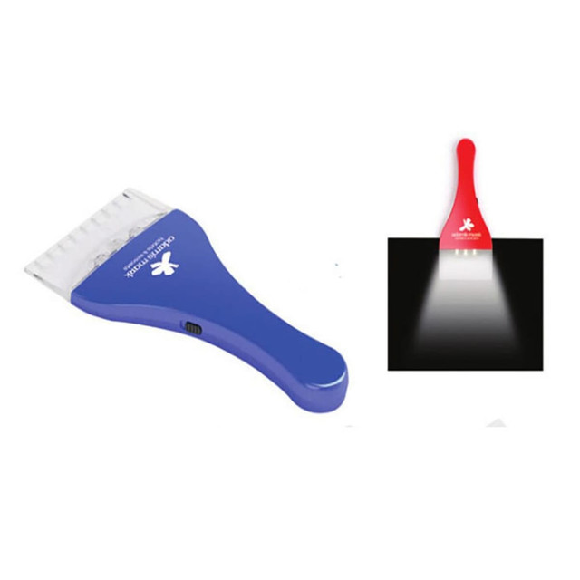 A blue ice scraper with a transparent blade and a built-in light, accompanied by a red version illuminating a dark surface.