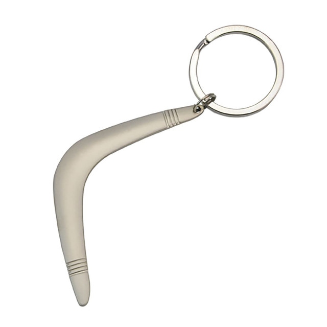 A grey boomerang-shaped key ring with a silver keychain attachment.