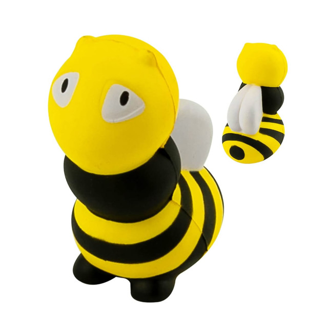 A stress-relief toy in the shape of a yellow and black bee with white wings and large eyes.