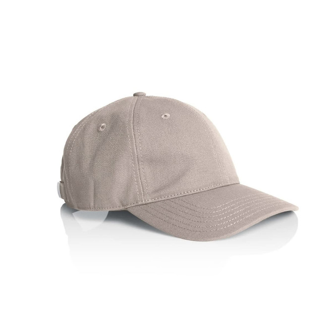 A beige canvas cap with a curved brim and a small logo patch on the side.