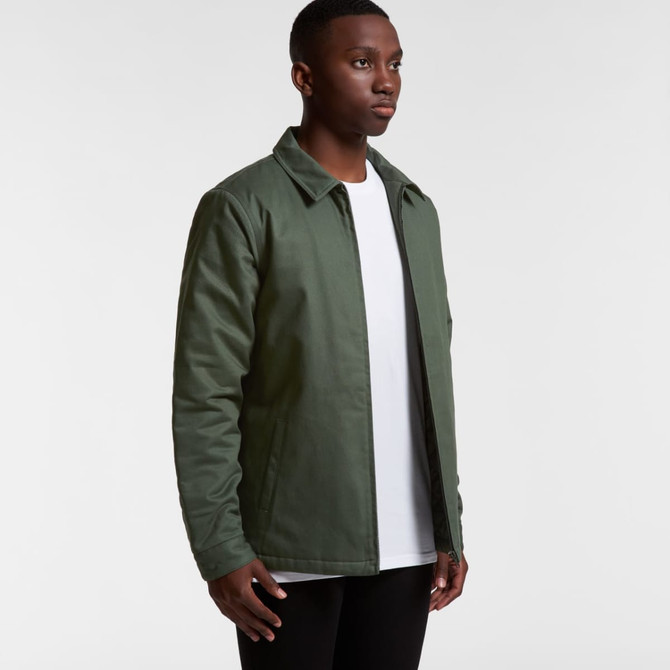 A green service jacket featured on a model, with a simple design and a logo on the chest.