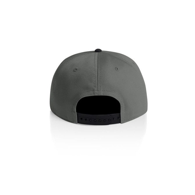 A two-tone cap in green and black with a logo on the back and an adjustable strap.
