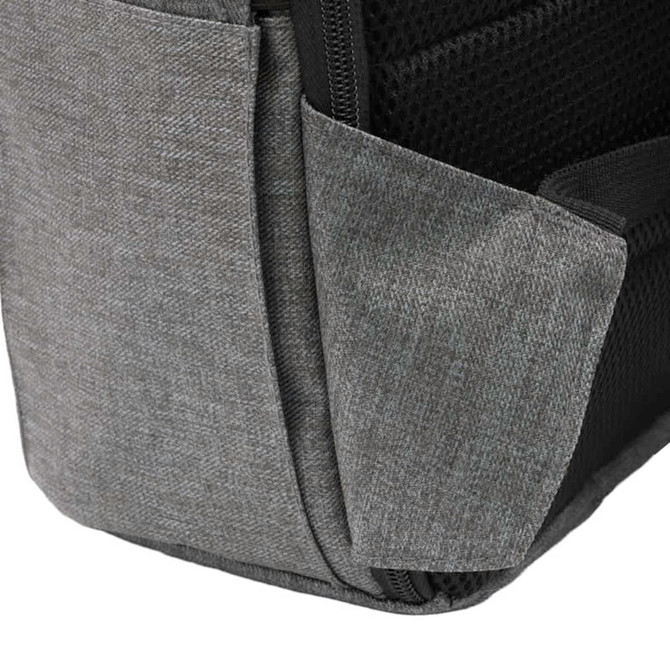 A grey computer backpack featuring a textured surface and a side pocket, with a logo on the front.