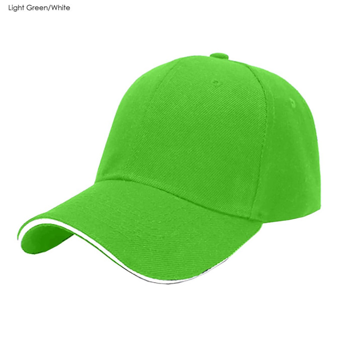 A light green cotton cap with a white accent and a logo, featuring a classic six-panel design.