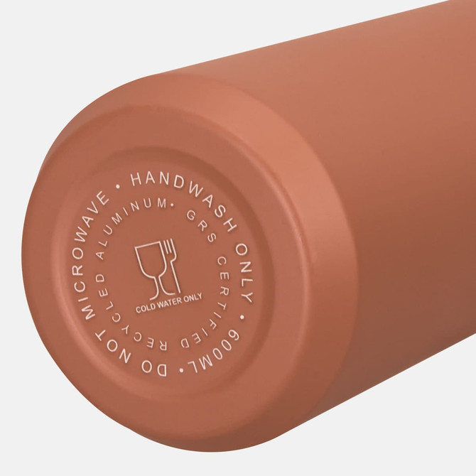 A drink bottle with a matte terracotta finish, featuring a logo and a smooth, rounded design.