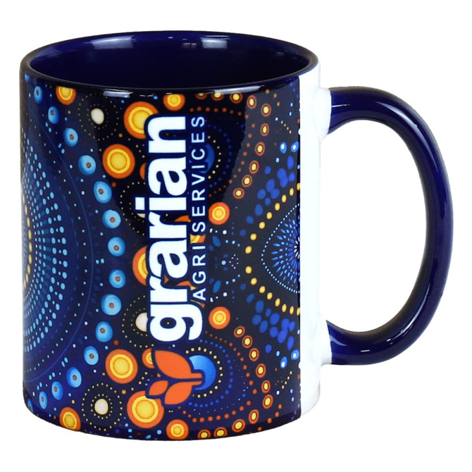 A ceramic coffee mug featuring a blue and white design with a vibrant, colourful pattern and a logo.