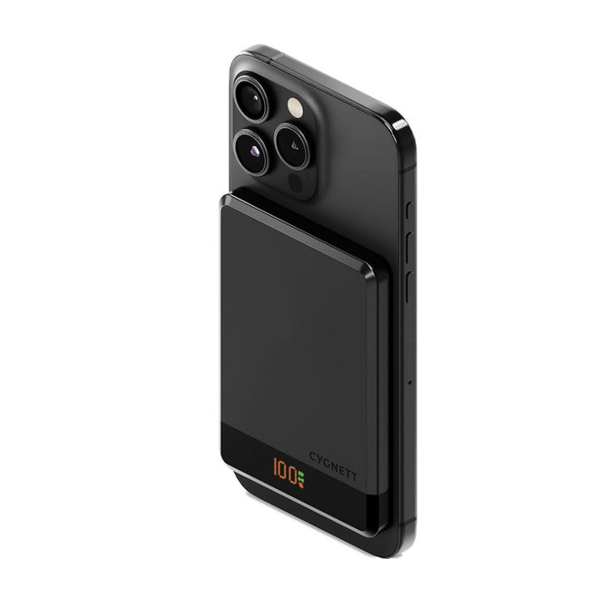 A black magnetic wireless power bank attached to a smartphone, featuring a sleek design and slim profile.