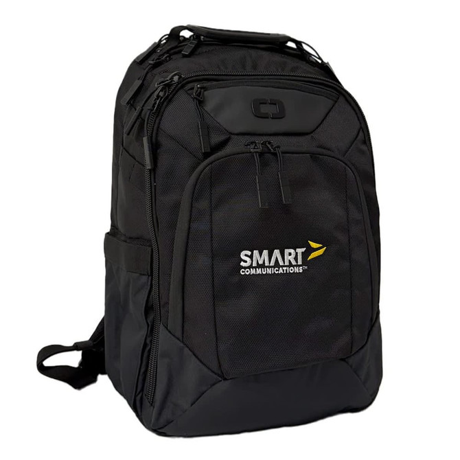 A black backpack with multiple pockets and zippers, featuring a logo on the front.