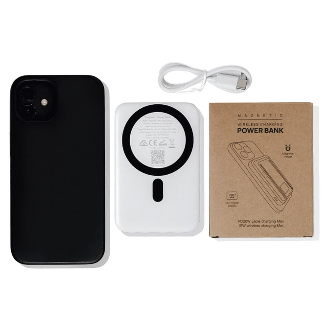 A white magnetic power bank with a phone stand, accompanied by a black phone and a charging cable.