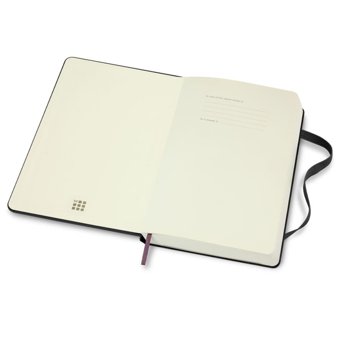 An open black Moleskine 2026 Daily Planner featuring blank pages and a ribbon bookmark. It has a logo on the cover.
