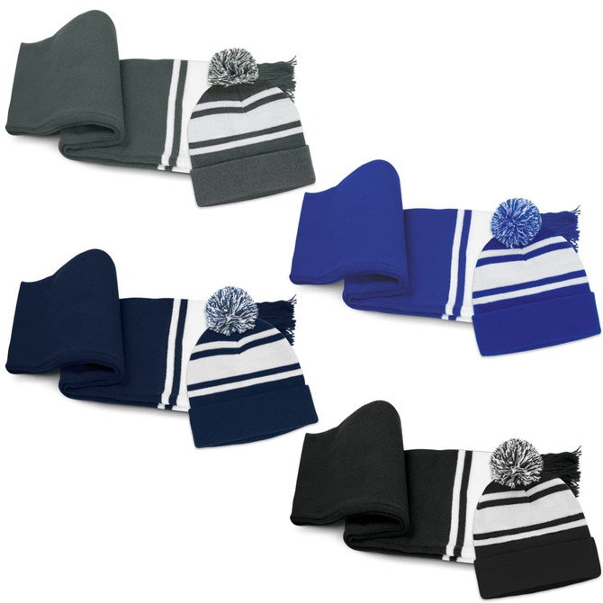 A beanie with a pom pom and a matching scarf set in grey, blue, navy, and black variations. Each set features striped detail.