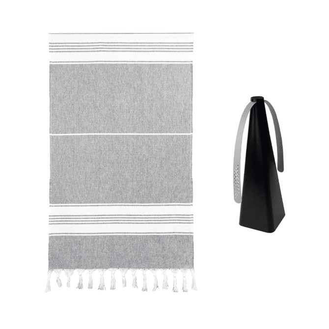 A grey and white striped towel beside a black drink bottle with a handle, featuring a simple design.