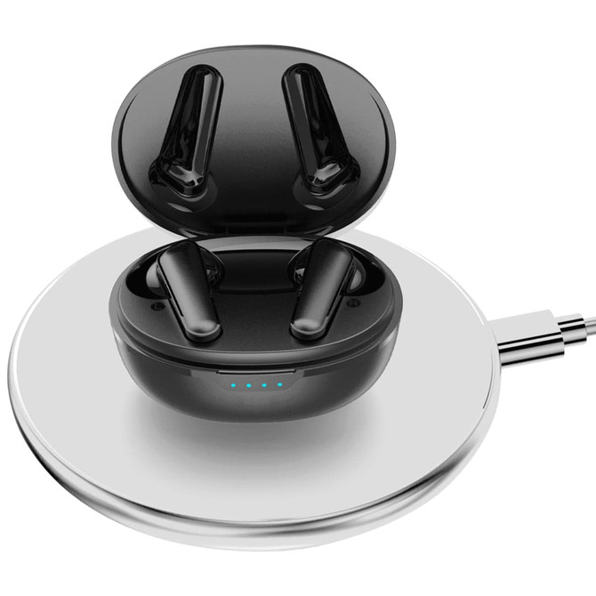 Black wireless earbuds in a glossy charging case, placed on a round charging pad.