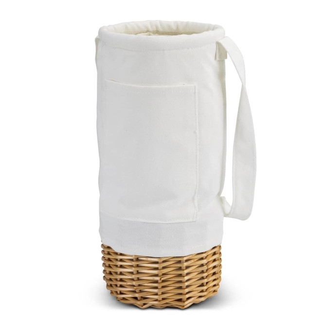A white fabric wine carrier with a wicker base and a side pocket, featuring a shoulder strap for easy transport.