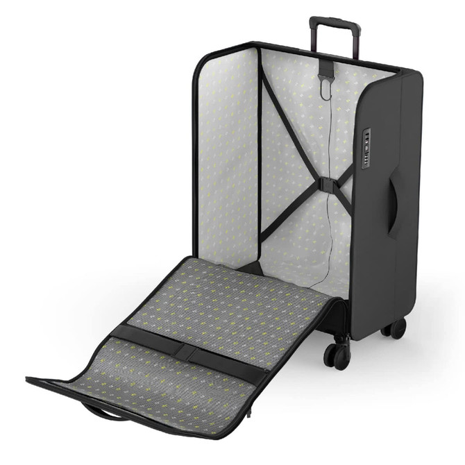 A black medium suitcase with a spacious interior, featuring a patterned lining and an extendable handle.