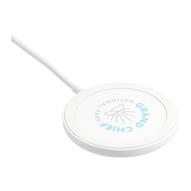 A white wireless charging pad with a circular design and a logo in the centre.