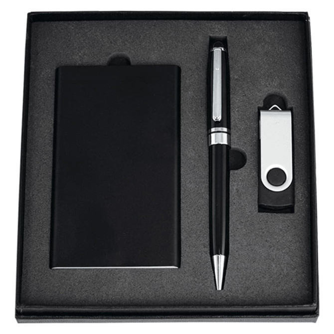 A black gift set featuring a USB power bank, silver pen, and USB drive, all in a presentation box.