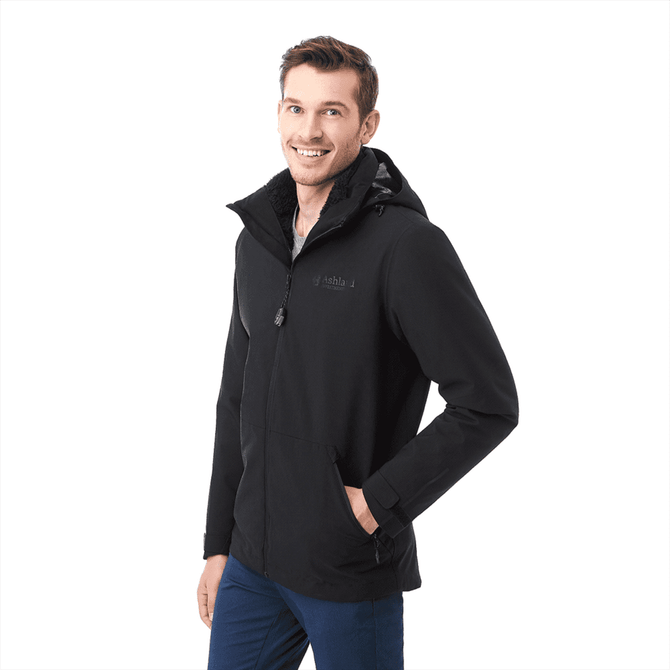 A men's black soft shell jacket with a hood and front pockets, featuring a logo on the chest.