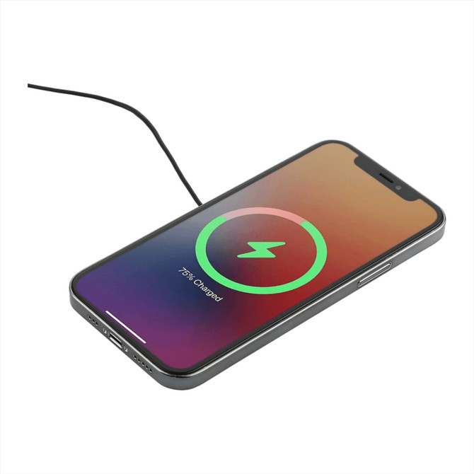 A wireless charging pad with a smartphone displaying a charging status indicator. The pad has a sleek design.