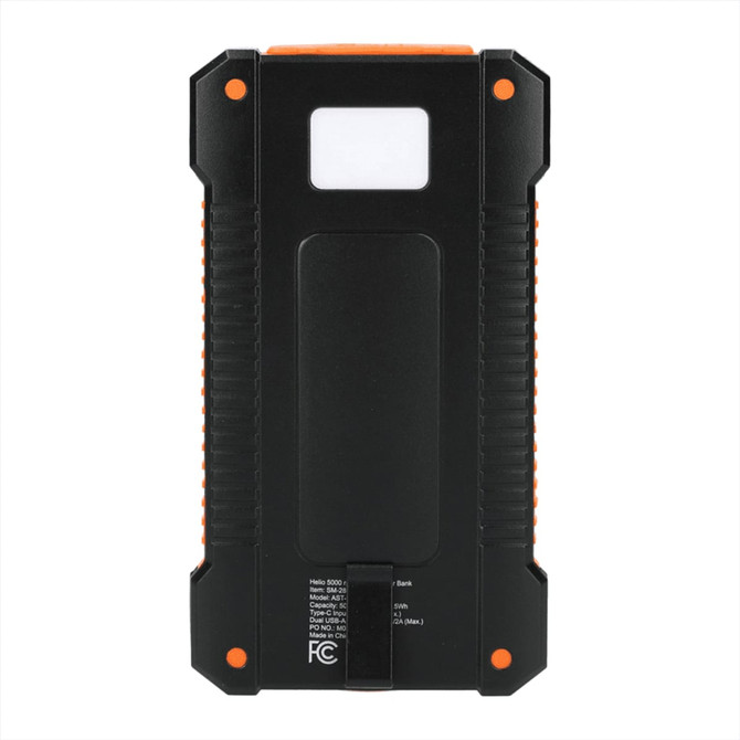 A black and orange solar power bank with textured grip surfaces and a small white light panel. It features a logo.