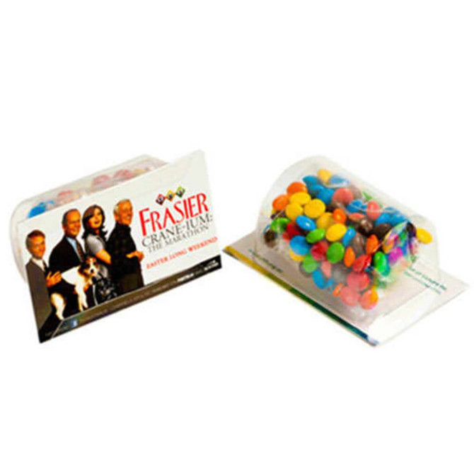 A promotional product featuring a clear container with various colourful mini M&Ms and a presentation card holder.