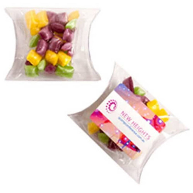 A clear pillow pack containing colourful humbugs in purple, yellow, green, and orange hues.