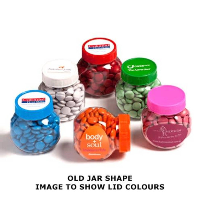 A selection of jars filled with colourful choc beans, featuring various lid colours and shapes, with branding on each jar.