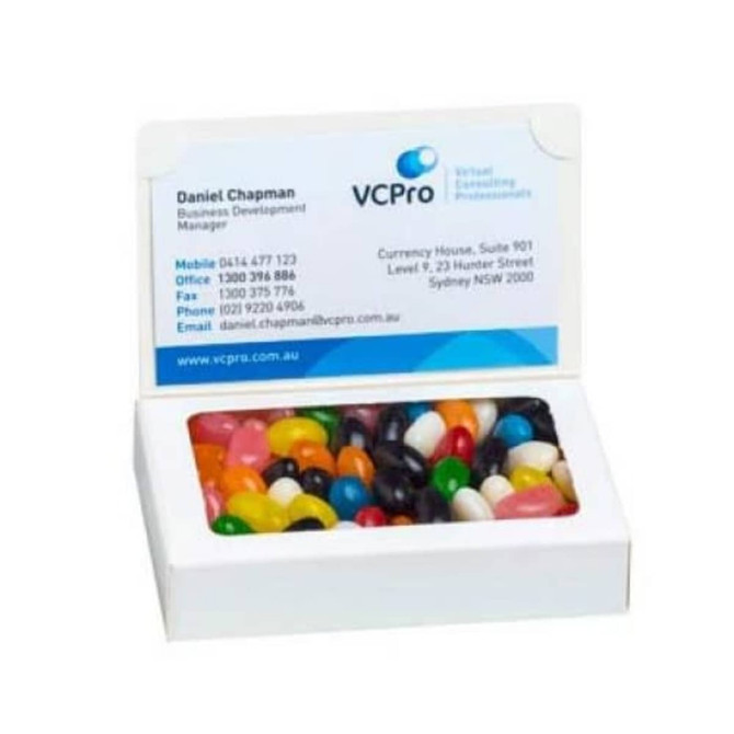 A white box containing a variety of colourful jelly beans, featuring a branding logo on the lid.