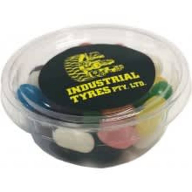A tub filled with various coloured jelly beans, featuring a lid with branding.