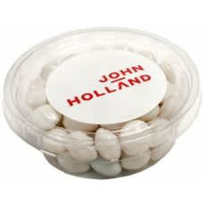 A clear tub filled with white mints, featuring a logo on the lid.