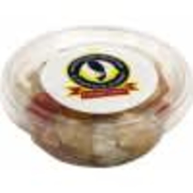 A clear tub containing a dried fruit mix, featuring various colours and a circular logo on top.