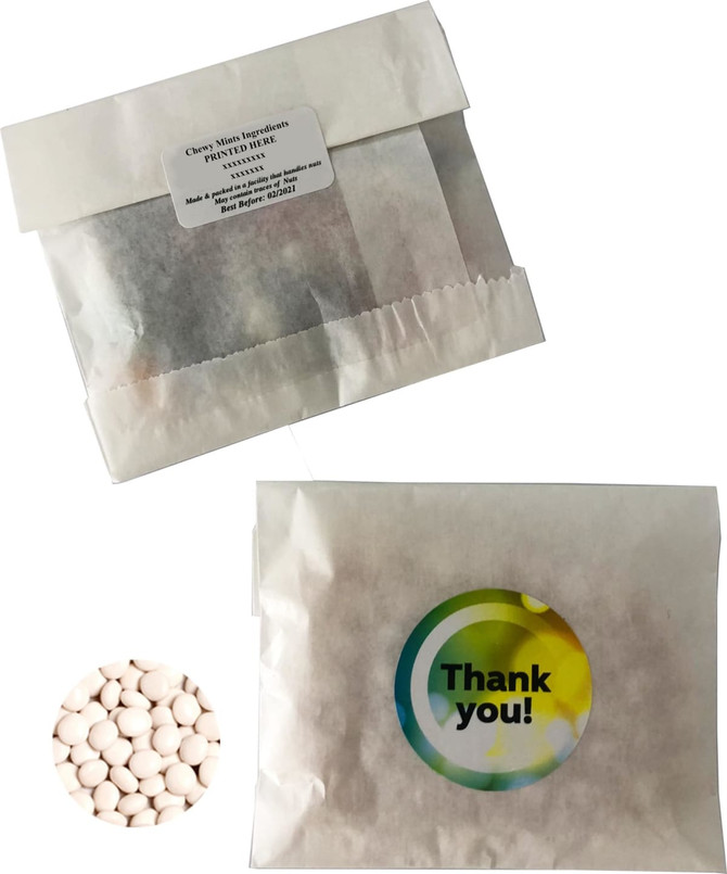 A kraft paper bag containing chewy mint candies, featuring a colourful logo and a thank you note.