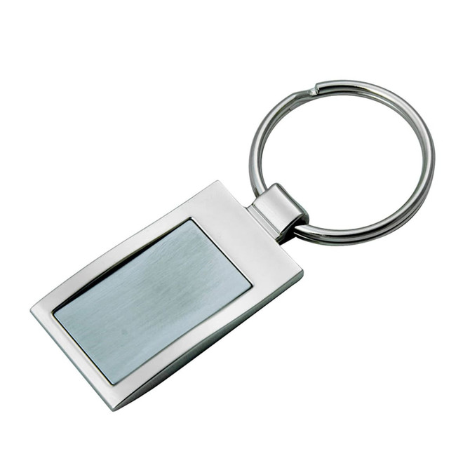 A silver square key ring with a polished finish, featuring a flat area for customization and a circular attachment.