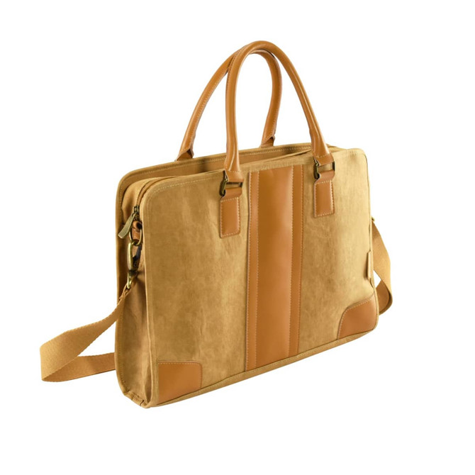 A tan satchel with leather accents and handles, featuring a shoulder strap and a logo.