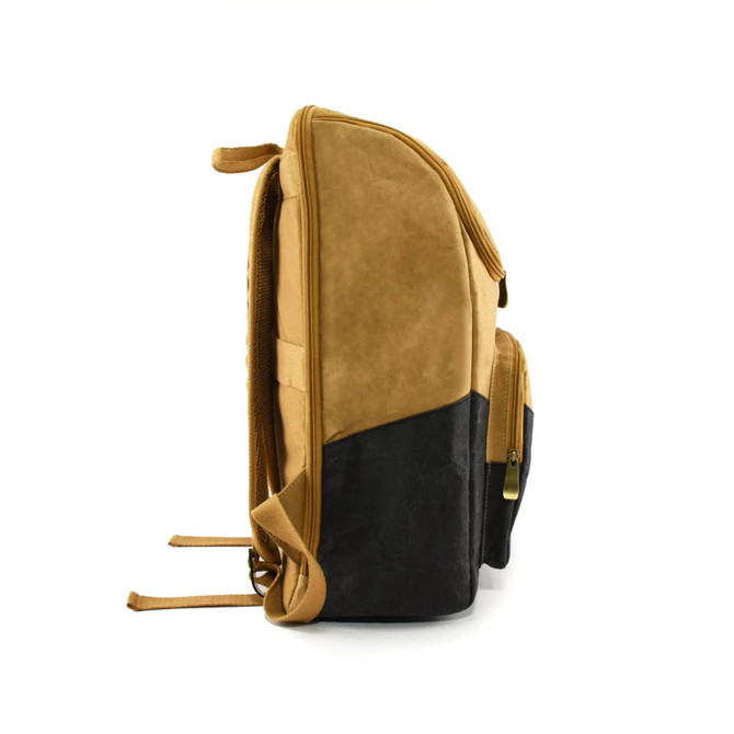 A tan and black laptop backpack with a structured design and a side profile view. It features a logo and adjustable straps.