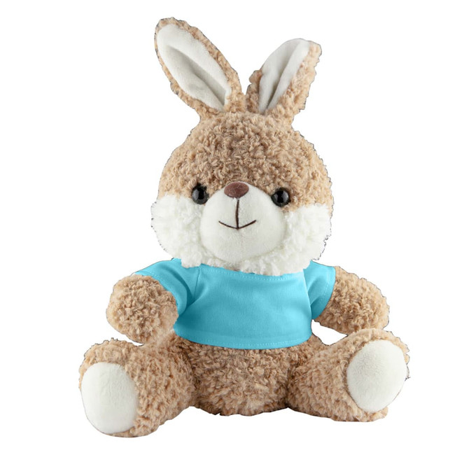 A stuffed rabbit plush in soft brown fur with white accents, wearing a light blue shirt. It has a logo on its shirt.