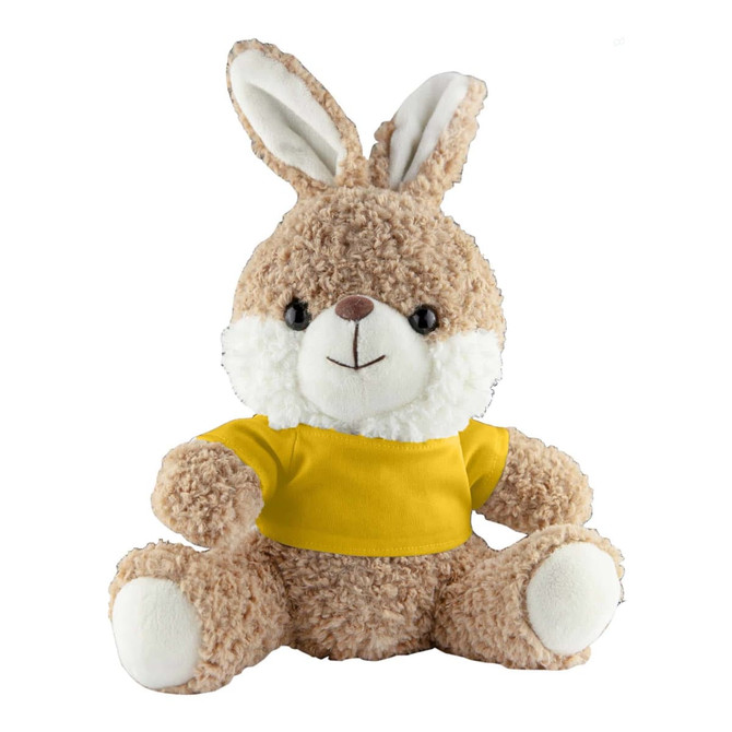 A fluffy brown rabbit plush toy with a white face and ears, wearing a yellow shirt. It has a cute, smiling expression.