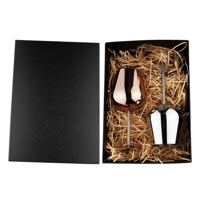 A stainless steel wine glass gift set in rose gold and silver, presented in a black box with straw filling.