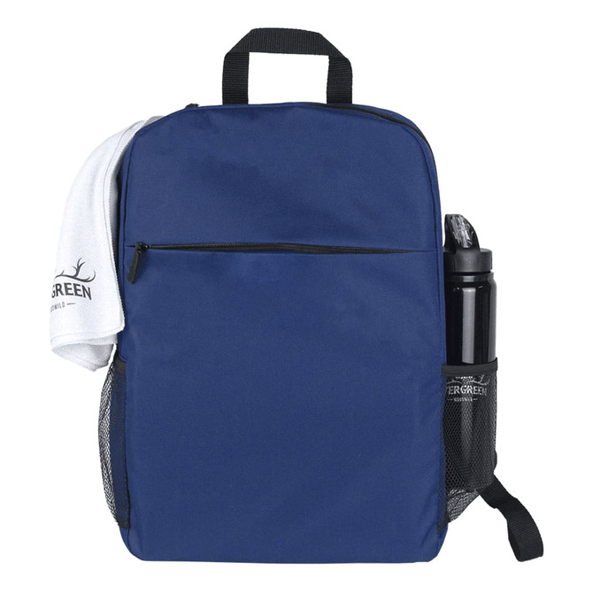 A navy backpack with a front zip pocket, a towel draped over the top, and a drink bottle in a side mesh pocket.
