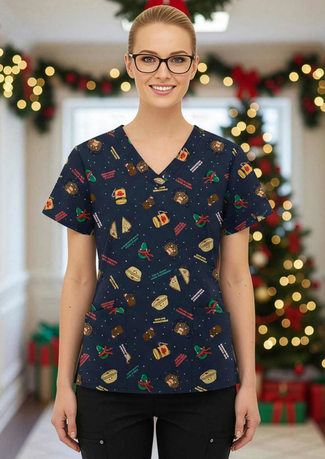 A navy women's scrub top with festive Christmas patterns, featuring various holiday-themed items and a logo.