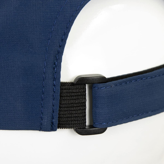 A navy cap featuring an adjustable strap with a plastic clasp and a smooth fabric finish.