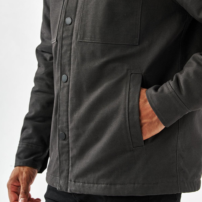 Men's jacket in dark grey, featuring a Sherpa lining and a front pocket. Includes a branded logo.