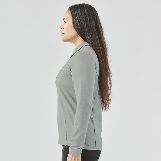 A women's long-sleeve micro pique polo in grey, featuring a collar and a fitted design.