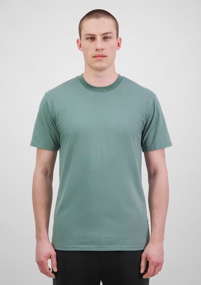 A green short sleeve tee displayed on a male model against a neutral background, featuring a logo.
